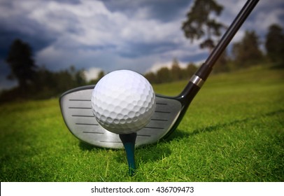 Golf Club And Ball In Grass