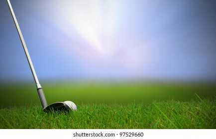 Golf Club Hitting Golf Ball Along Fairway Towards Green With Copy Space