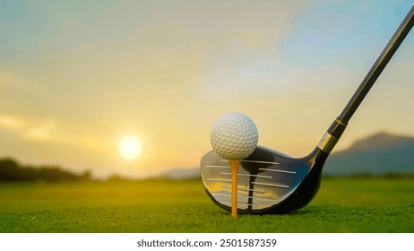 Golf clubs and balls on a green lawn in a beautiful golf course with morning sunshine. Close up of golf equipment on green grass.                                 - Powered by Shutterstock