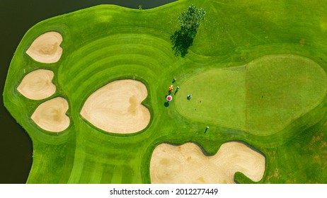 Golf course beautiful Aerial view of golf field landscape with sunrise view in the morning shot. Bangkok Thailand - Powered by Shutterstock