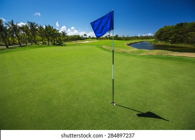 Golf course. Beautiful landscape of a golf court with palm trees in Punta Cana, Dominican Republic