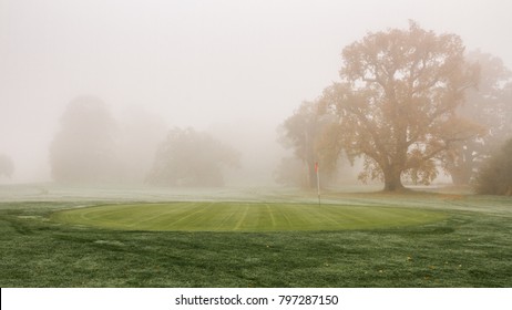 Golf course green in heavy fog - Powered by Shutterstock