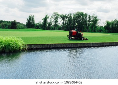 Golf Course Maintenance Worker, Cutting The Grass