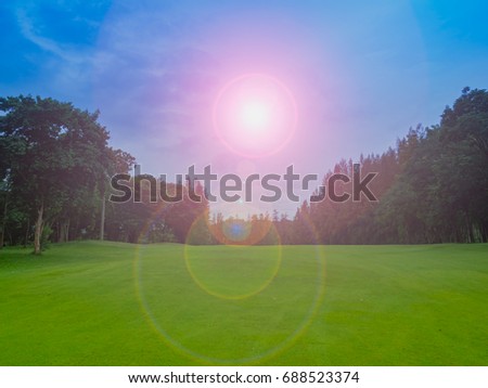 Similar – Golf Flag on Pristine Green at Sunset surrounded by lush trees in the warm glow of sunset. Perfect for illustrating the beauty of golf, nature, and serene outdoor sports.