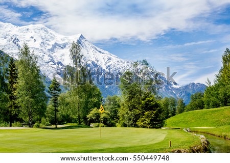 Golf course  over snow covered Mont Blanc in Chamonix, France.