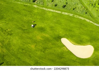 Golf Course With Sand Bunker And Green Grass, Aerial View.