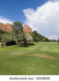 Golf Course In Sedona Beside Red Rock Mountains