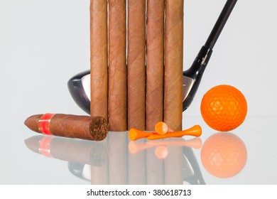 Golf Driver And Different Cigars On A Glass Table