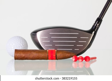 Golf Driver And Different Cigars On A Glass Table