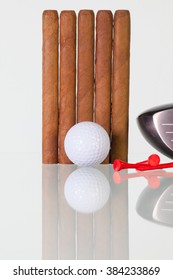 Golf Driver And Different Cigars On A Glass Table