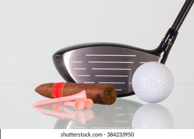 Golf Driver And Different Cigars On A Glass Table