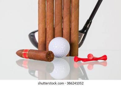 Golf Driver And Different Cigars On A Glass Table