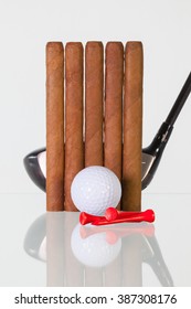 Golf Driver And Different Cigars On A Glass Table