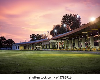 Golf Driving Range With Sunset