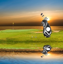 Golf Equipment , Golf Bag ,putter ,ball On Green With Beautiful Light Reflect On The Water.