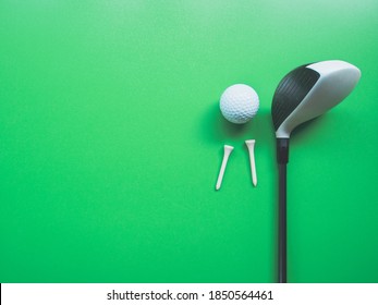 Golf Equipment Flat Lay On Green Background. Top View