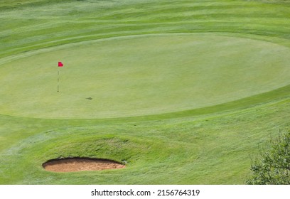 Golf Green With Flag, Hole And Bunker, Viewed From Above, Aerial View Of Golf Course, UK