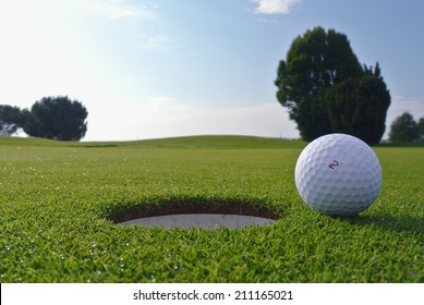 Golf Hole And Ball