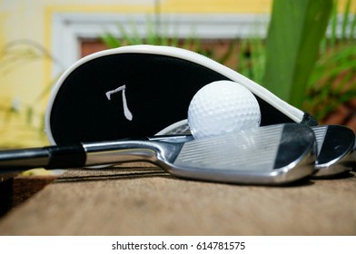 Golf Iron Cover For Iron Seven With Iron And A Ball