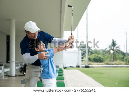 Golf lesson capturing a coach guiding a child through active swing execution, highlighting real time correction and coordination development.