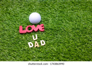 Golf love you dad with golf ball Happy Father's Day on green grass - Powered by Shutterstock