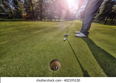 Golf Putting In Green