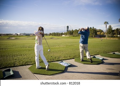 Golf Swings At The Practice Range