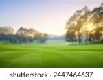 Golf teeing ground in golf course with sunrise background.