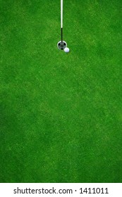 Golfball Almost In The Hole On A Beautiful Golf Course - Top View