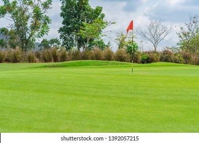 Golfcourse, Beautiful landscape of a golf court with trees and green grass.