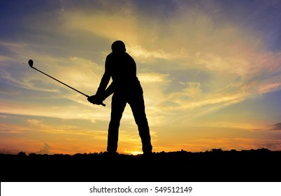 Golfer Playing Golf During Beautiful Sunset At Competition Event