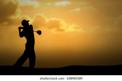 Golfer Swing Hit Golf Ball, Silhouette Sunset Scene, Copy Space On Right Side.