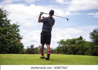 Golfer Taking A Bad Swing Off The Tee, Shanking The Ball And Losing Grip Of The Club