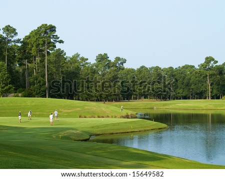 Golfers enjoying a fine day on this beautiful Myrtle Beach golf course in South Carolina.