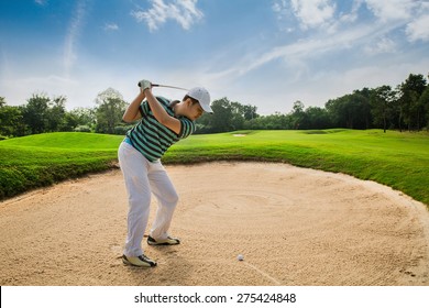 Golfers Are Hit Ball On The Sand Courts