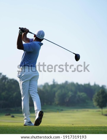 Golfers are playing golf at field court selective focus background . Fit for golf tournament sport tee cover banner 