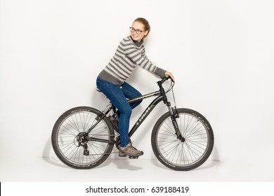 GOMEL, BELARUS - May 12, 2017: Mountain Bike TRACK On A White Background. The Girl Is Riding