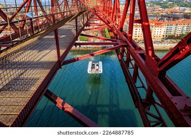 The gondola of Biscay Suspension Bridge in Portugalete. Bilbao, Basque country, Spain. Flying ferry across the Nervion River