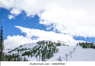 Gondola Rides At Mammoth Mountain Ski Area With Snow Background. Winter Scenic In California.