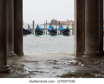 Gondolas floating on high tide during the flood in Venice, november 2019. 4k