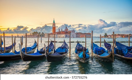 Gondolas moored by Saint Mark square with San Giorgio di Maggiore church in Venice, Italy,16:9 Ratio