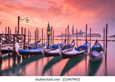 Gondolas in Venice, Italy at dawn on the Grand Canal.