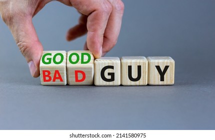 Good Or Bad Guy Symbol. Businessman Turns Cubes And Changes Concept Words Bad Guy To Good Guy. Beautiful Grey Background. Business Psychological Good Or Bad Guy Concept. Copy Space.