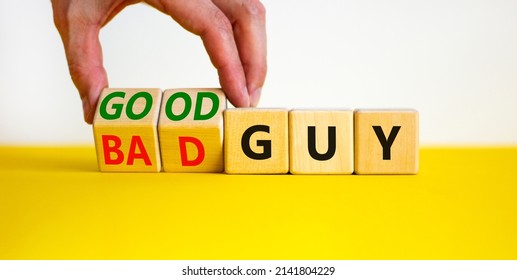 Good Or Bad Guy Symbol. Businessman Turns Cubes And Changes Concept Words Bad Guy To Good Guy. Beautiful White Background. Business Psychological Good Or Bad Guy Concept. Copy Space.