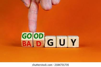 Good Or Bad Guy Symbol. Businessman Turns Cubes And Changes Concept Words Bad Guy To Good Guy. Beautiful Orange Background. Business Psychological Good Or Bad Guy Concept. Copy Space.