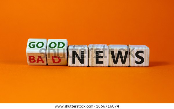 Good or bad news concept. Fliped\
cubes and changed the words \'bad news\' to \'good news\'. Beautiful\
orange background. Business and good news concept. Copy\
space.