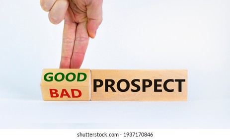 Good or bad prospect concept. Businessman turns a block and changes words 'bad prospect' to 'good prospect'. Beautiful white background. Business, good or bad prospect concept. Copy space.