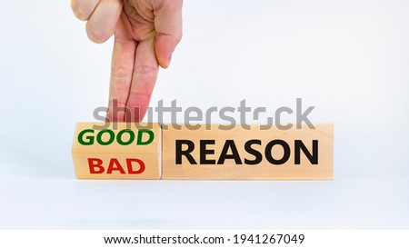 Good or bad reason symbol. Businessman turns cubes and changes words 'bad reason' to 'good reason'. Beautiful white background. Copy space. Business, good or bad reason concept.