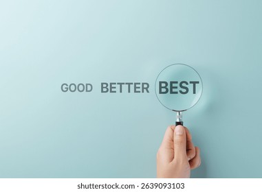 Good Better Best Performance Evaluation Concept. A hand holds magnifying glass over word BEST in sequence reading GOOD BETTER BEST, symbolizing quality improvement, ranking, and performance assessment