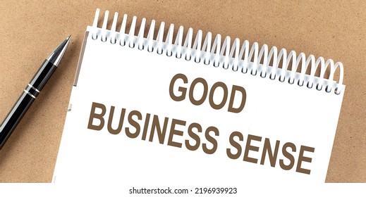 GOOD BUSINESS SENSE Text On Notepad With Pen, Business